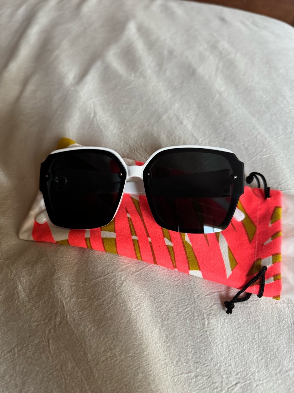 Women’s White Frame Sunglasses with Black Lenses